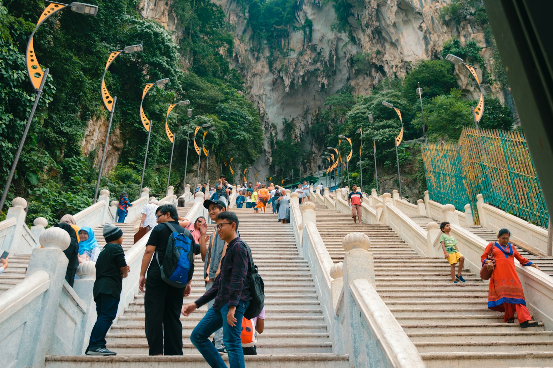International travellers exploring the Batu Caves near Kuala Lumpur, Malaysia
